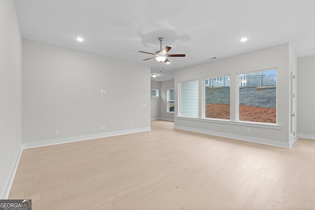 interior space featuring ceiling fan and light wood-type flooring