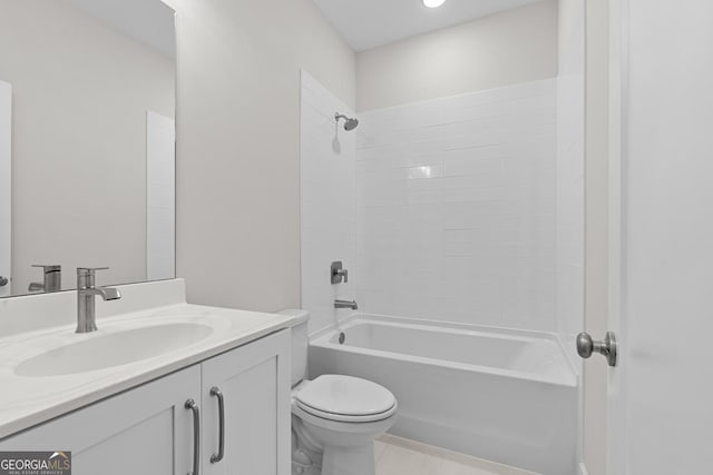 full bathroom featuring vanity, toilet, and tiled shower / bath