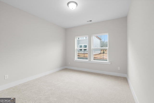 view of carpeted spare room