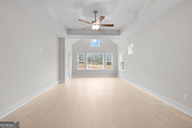 unfurnished living room with ceiling fan and light hardwood / wood-style floors