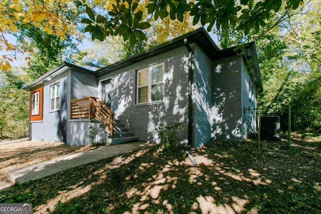 view of home's exterior featuring central AC