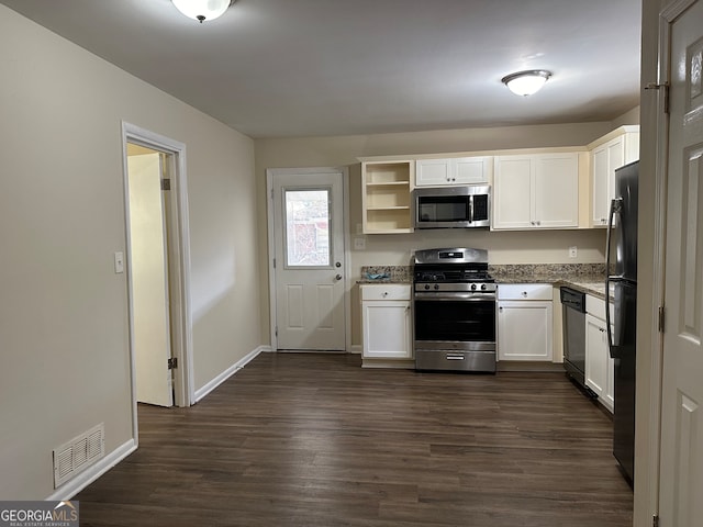 kitchen featuring white cabinetry, dark hardwood / wood-style flooring, and appliances with stainless steel finishes