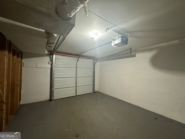 garage featuring a garage door opener