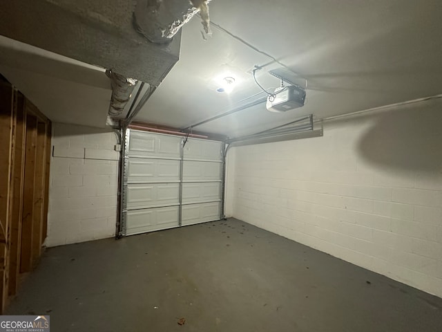 garage featuring a garage door opener