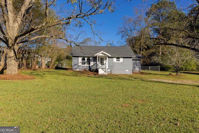 view of front of house with a front yard