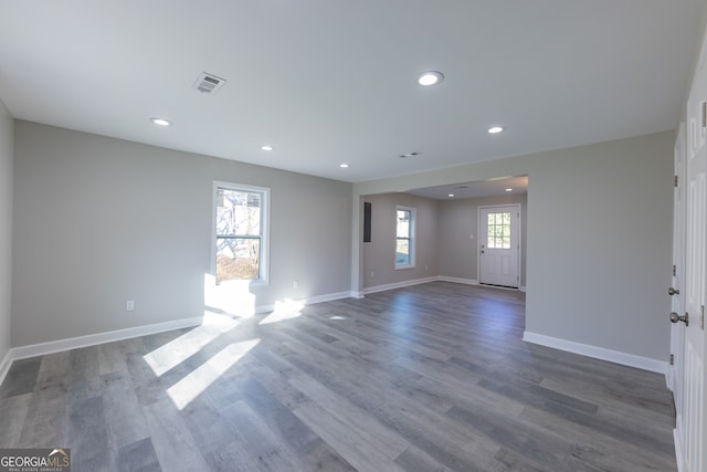 unfurnished room featuring wood-type flooring