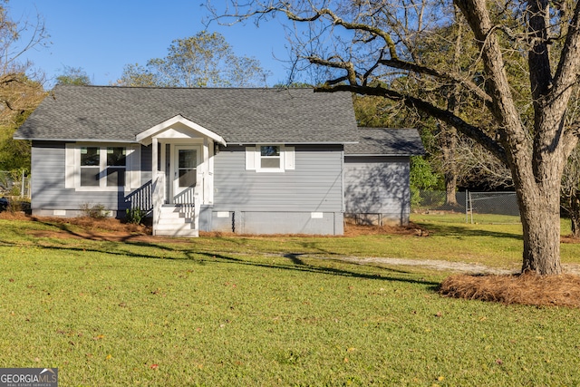 view of front of property with a front lawn