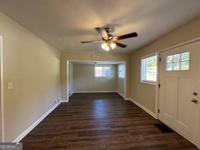 entryway featuring ceiling fan and dark hardwood / wood-style flooring