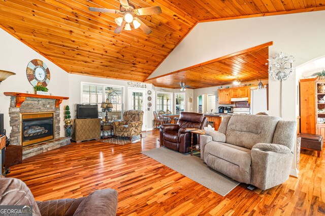 dining room featuring ceiling fan, wood ceiling, crown molding, and light hardwood / wood-style flooring