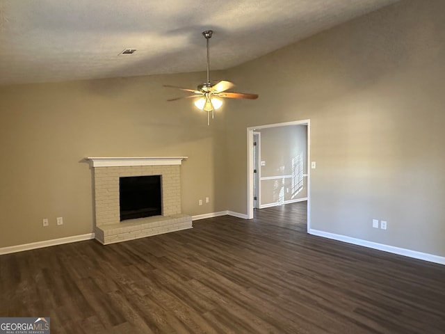 unfurnished living room featuring high vaulted ceiling, ceiling fan, a fireplace, a textured ceiling, and dark hardwood / wood-style flooring