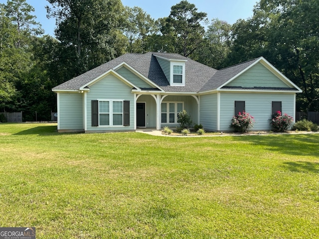 view of front of property with a front lawn