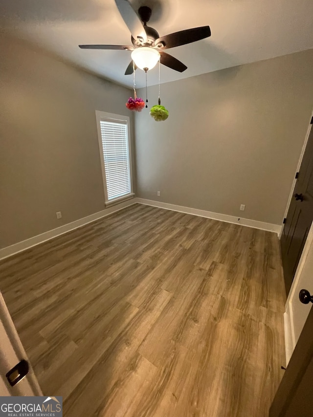 empty room featuring hardwood / wood-style floors