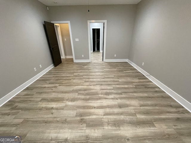 unfurnished bedroom with light hardwood / wood-style flooring