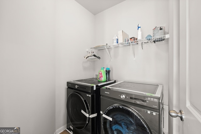 laundry area featuring washer and clothes dryer