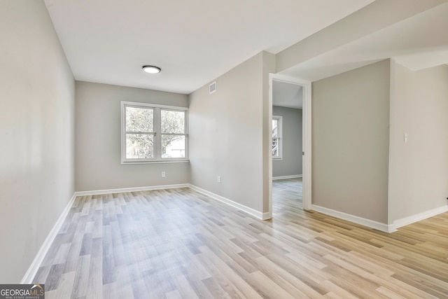 empty room featuring light hardwood / wood-style floors