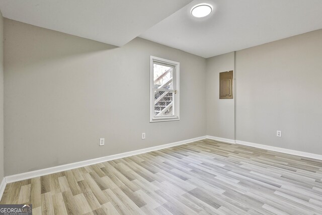 unfurnished room featuring light wood-type flooring