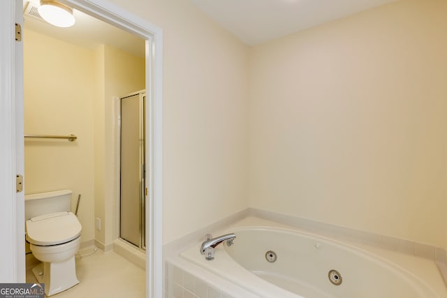 bathroom with tile patterned flooring, separate shower and tub, and toilet