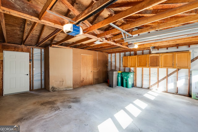 garage featuring a garage door opener