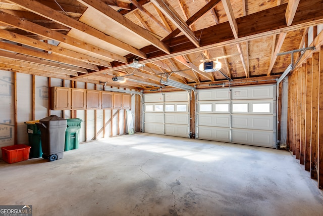 garage featuring a garage door opener