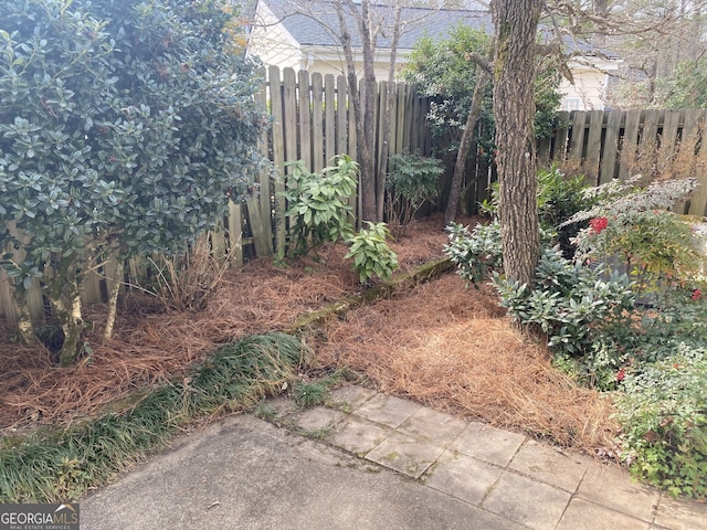 view of yard with fence