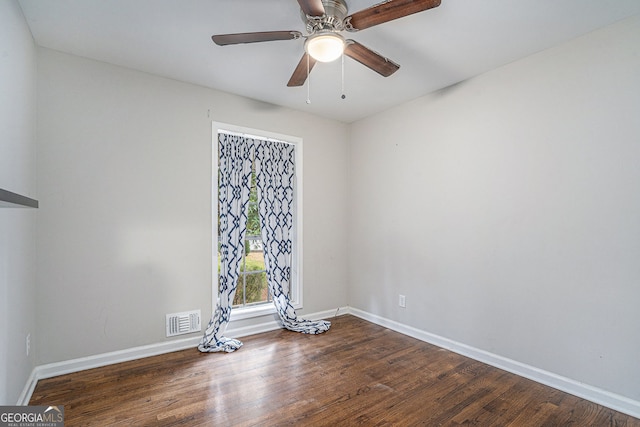 empty room with wood-type flooring and ceiling fan