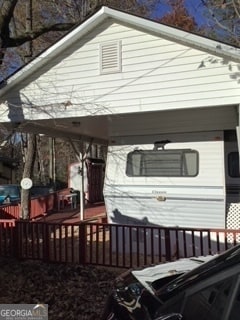 view of front of house with a deck