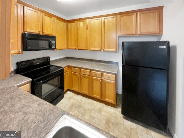 kitchen featuring black appliances