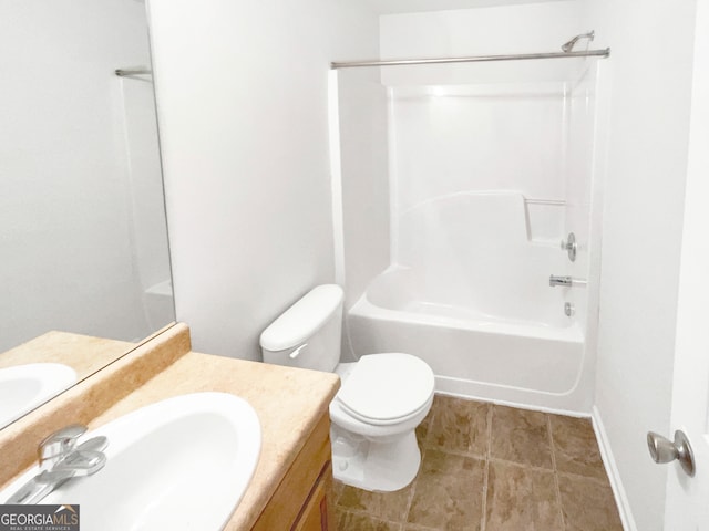 full bathroom featuring tile patterned floors, vanity, toilet, and shower / washtub combination