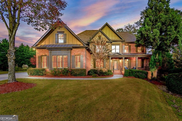 craftsman house featuring a yard