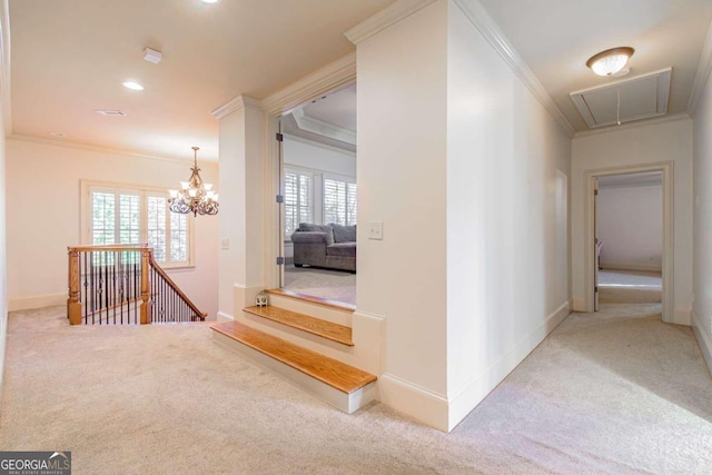 hallway with carpet floors, crown molding, and a healthy amount of sunlight