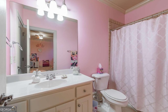 bathroom with a shower with shower curtain, vanity, toilet, and crown molding