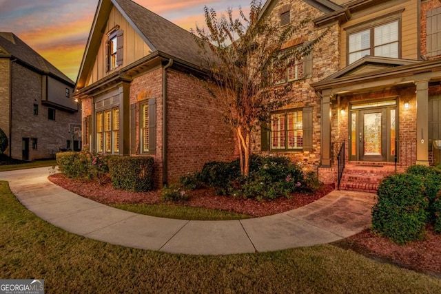 view of property exterior at dusk