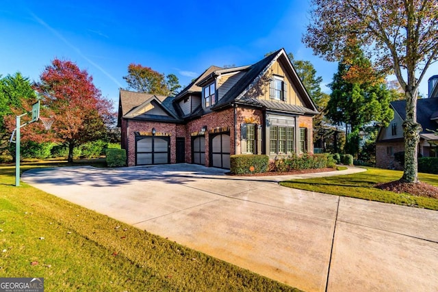 view of front facade featuring a garage and a front lawn