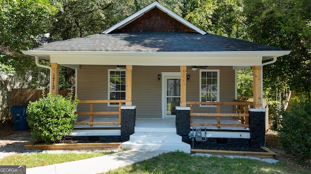 view of front of property with ceiling fan and a porch