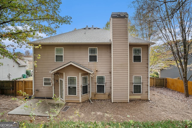 back of house with a patio area