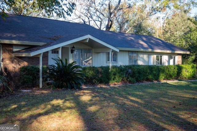 view of property exterior with a yard