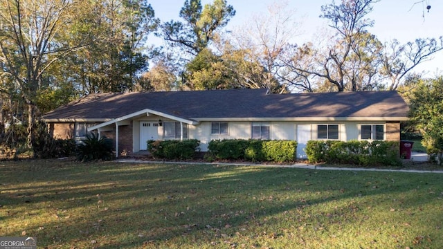 ranch-style home with a front yard