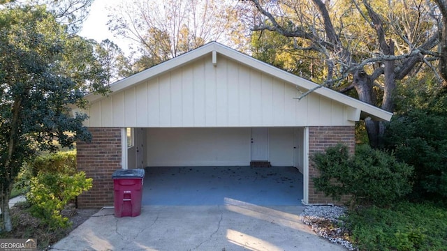 garage featuring a carport