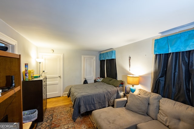 bedroom featuring hardwood / wood-style floors