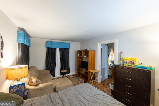 bedroom featuring light wood-type flooring