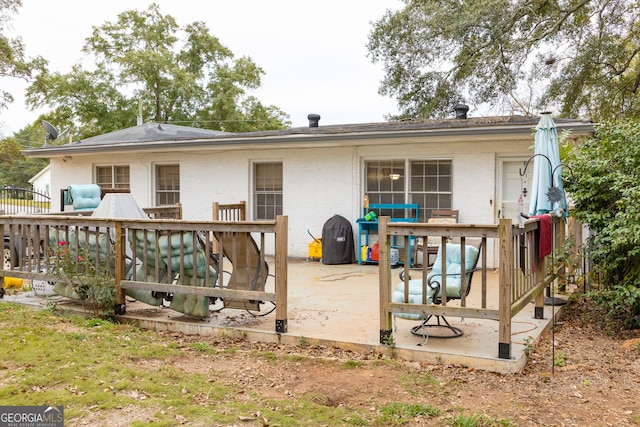 rear view of house featuring a patio area