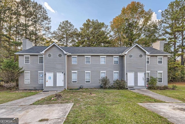 view of front of house featuring a front lawn