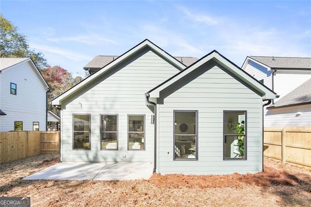 rear view of property with a patio