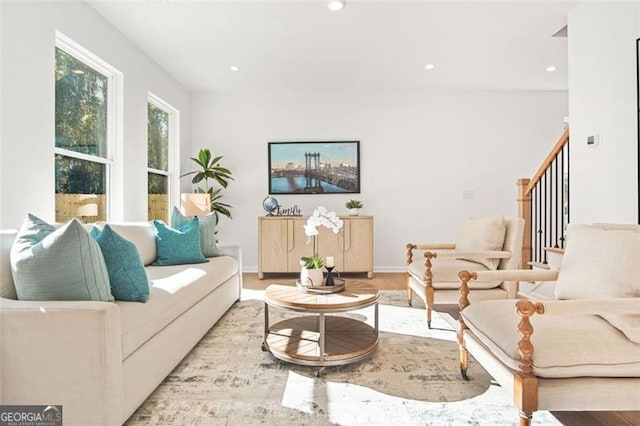 living room with light hardwood / wood-style flooring