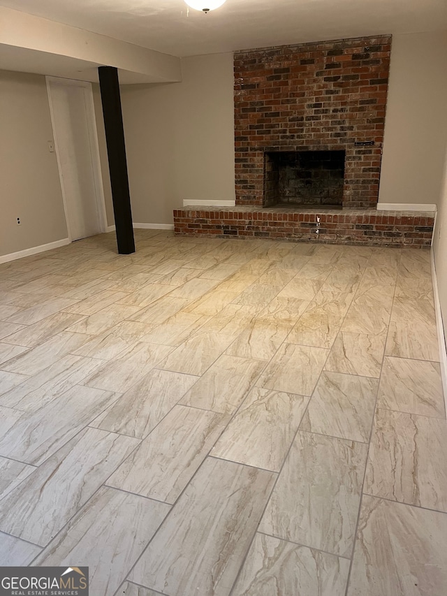 unfurnished living room featuring a fireplace