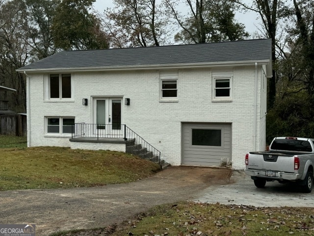 bi-level home with a garage