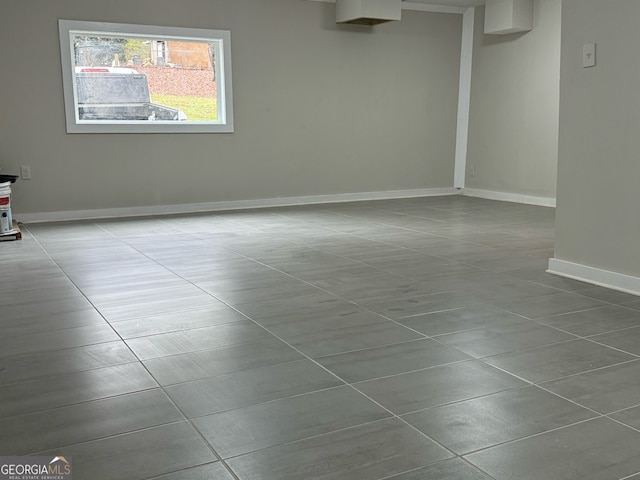 spare room featuring tile patterned floors