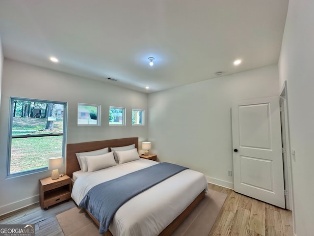 bedroom featuring light wood-type flooring