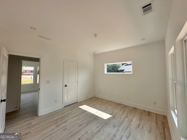 unfurnished bedroom with light hardwood / wood-style floors