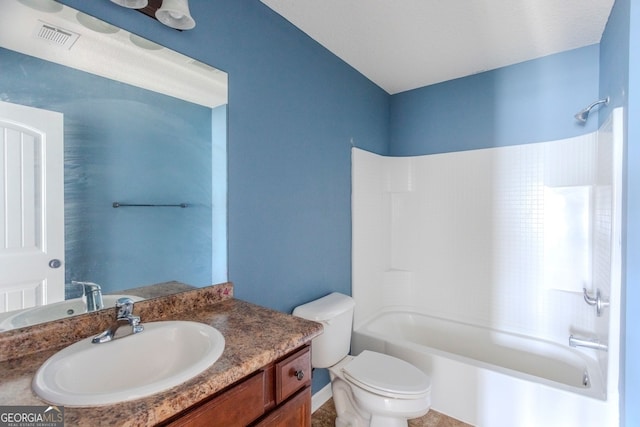 full bathroom featuring vanity, toilet, and bathing tub / shower combination